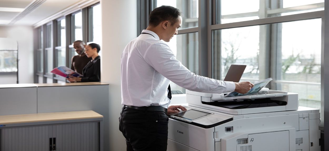 man at copier